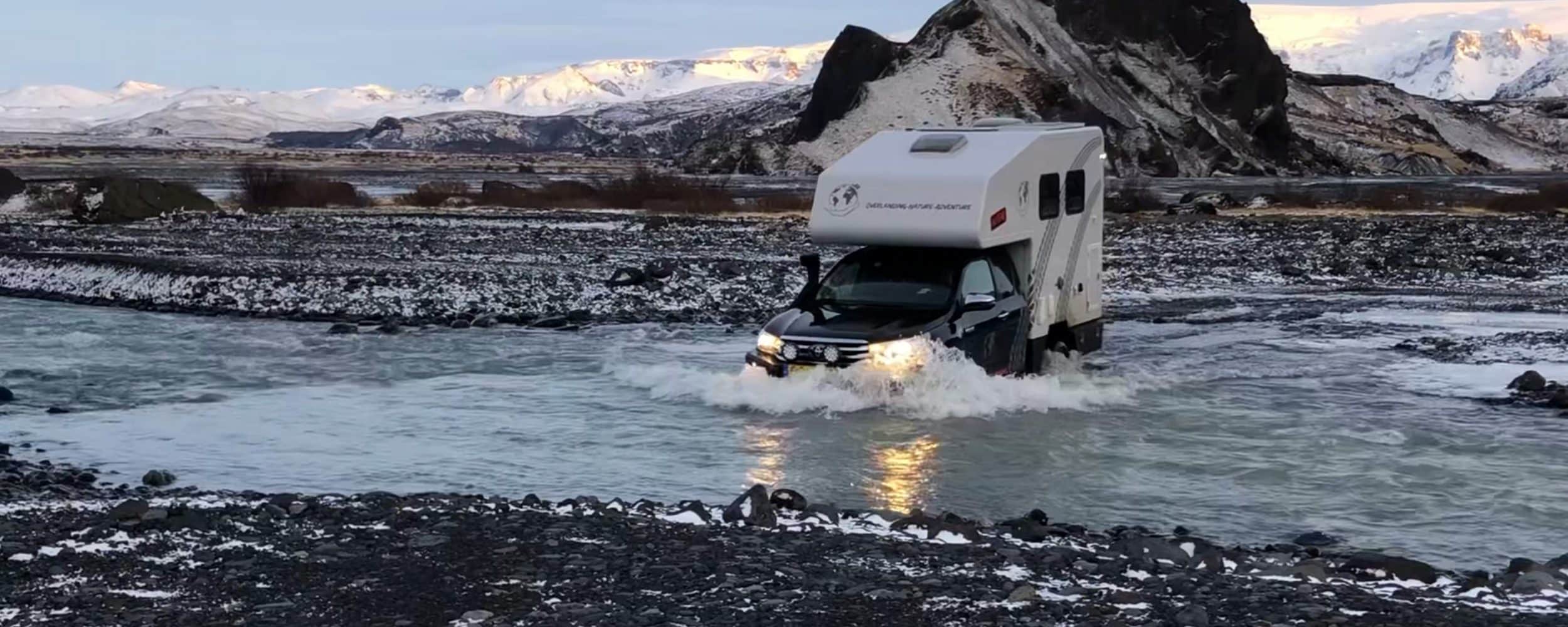 crossing the river with a 4x4 camper roadtrip Iceland