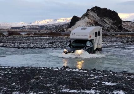 crossing the river with a 4x4 camper roadtrip Iceland